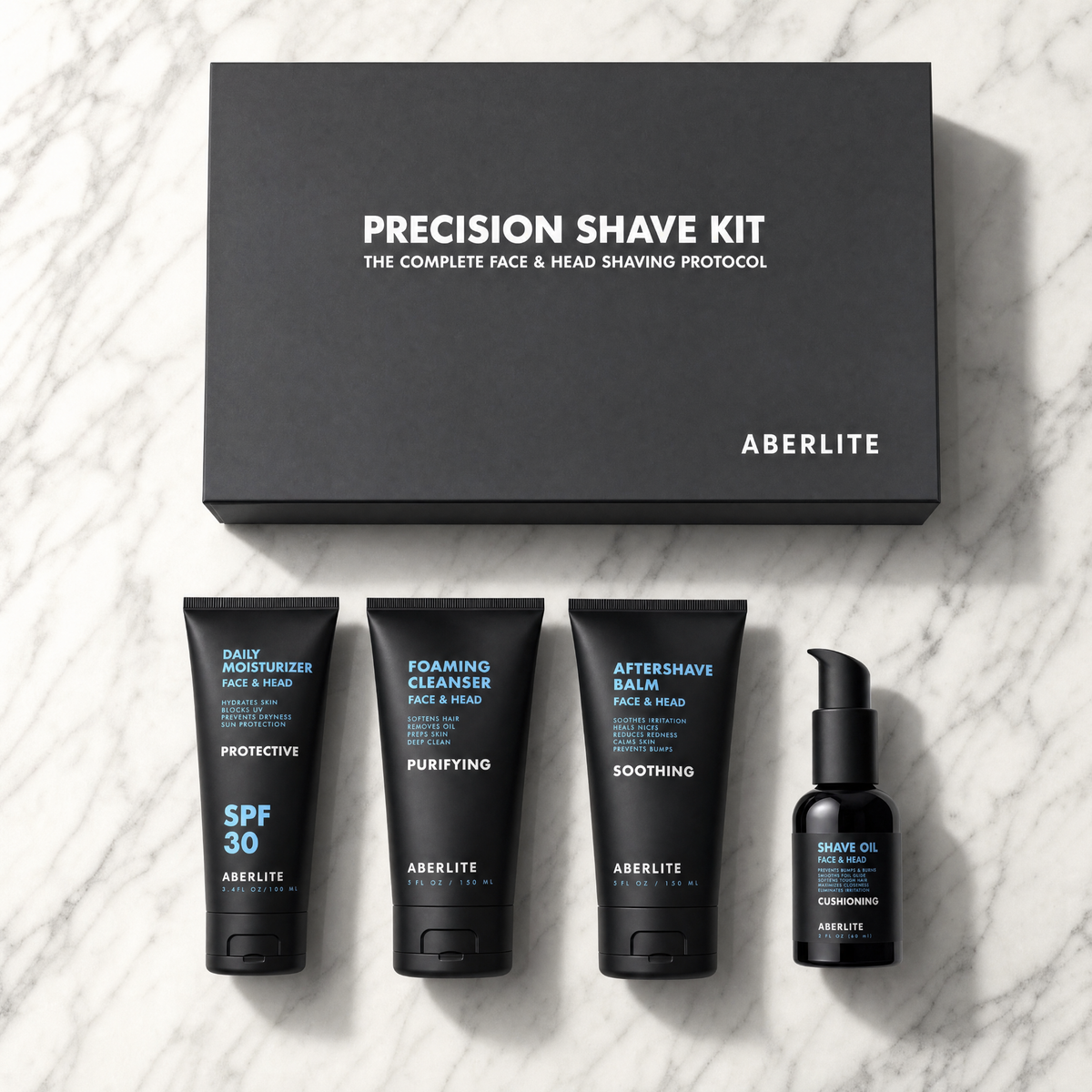 Precision Shave Kit by Aberlite with black packaging and product bottles on a textured white background